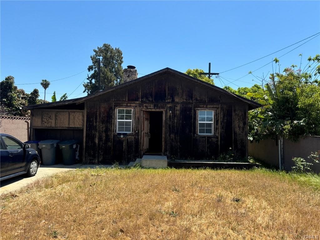Property before the Flip It Rich renovation